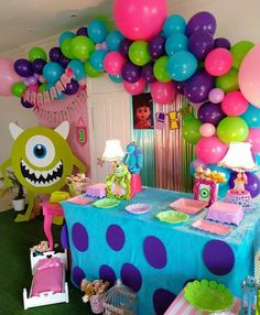 a birthday party with balloons and decorations