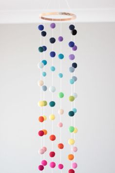 a multicolored mobile hanging from the ceiling