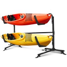 two kayaks sitting on stands next to each other