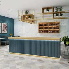 the interior of a restaurant with blue walls and gold trimmings on the counter