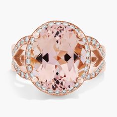 Stunning in every way, this gemstone and diamond ring features an oval morganite surrounded by brilliant diamonds and complemented in 18k rose gold. To prevent damage to this delicate stone, we do not recommend this ring for daily wear. Engagement Rings Pink Stone, Engagement Rings Pink, Pink Stone Engagement Rings, Rings Pink, Pink Engagement Ring, Precious Gemstones Jewelry, Diamond Halo Ring, Pink Power, Halo Diamond Ring