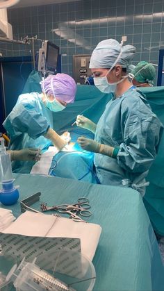 two surgeons performing surgery in an operating room