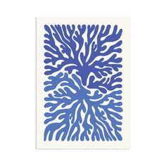 a blue and white paper cut out of corals