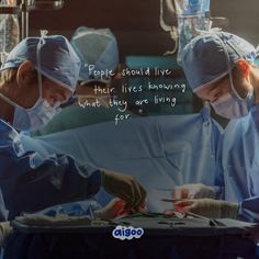 two surgeons performing surgery in an operating room with the caption people should live their lives having what they are living for