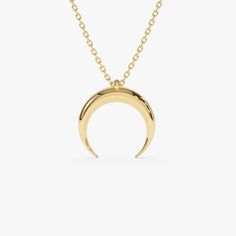 Unveil the magic of our 14K Solid Gold Crescent Moon Necklace, a symbol of elegance and bohemian flair. Perfectly crafted as a Double Horn design, this piece is ideal for daily layering, adding a touch of sophistication to your everyday look. Celebrate friendships with this Simple Layering Necklace, making it a thoughtful Best Friend Gift from our curated collection of timeless jewelry. ▶ Details   * Made to Order * Gold KT: 14K Solid Gold (also available in 18K upon request) * Length & Width: 13.5 MM * Ready to Ship in 1-2 Business Days ▶ See more of our Gold Necklaces - http://etsy.me/2lUxj86   ▶ See our storefront here - http://etsy.me/2lUcVnH  ▶ All store sections here * Diamond Rings - http://etsy.me/2lwKUl8  * Diamond Earrings - http://etsy.me/2lyqVBP  * Diamond Necklace - http://ets Luxury Engraved Crescent Necklace, Gold Crescent Moon Necklace, Crescent Moon Necklace Gold, Double Horn Necklace, Gold Crescent Moon, Gold Armband, Horn Necklace, Crescent Moon Necklace, Ruby Jewelry