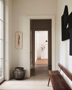 the hallway is clean and ready for us to use as an entrance way in this home