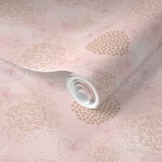 a pink and gold wallpaper with floral designs on the back ground, it looks like something out of a fairy tale