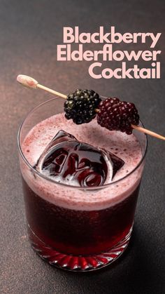 the blackberry elderflower cocktail is garnished with blackberries