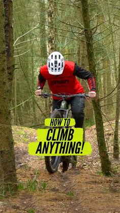 a person riding a bike in the woods with a sign that says how to climb anything