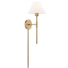 a brass wall light with a white shade