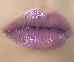 What happens when you mix the colors of the Bisexual Pride flag together? You get this gorgeous purple color reminiscent of an Amethyst crystal! You can wear one coat for a light purple shimmer or layer it up for more pigment and shine. Wether you're part of the LGBTQ+ community or an ally anyone can wear this gloss! Made with coconut and Vitamin E oil for a smooth and non-sticky gloss. It comes in strawberry flavored or unscented in a 5ml tube.  (Vegan and cruelty free) For every crystal gloss sold $1 will be donated to The Trevor Project! Bisexual Pride Flag, Vitamin E Oil, Lip Balm Gloss, Light Purple, Amethyst Crystal, Vitamin E, Purple Color, Makeup Cosmetics, Lip Gloss