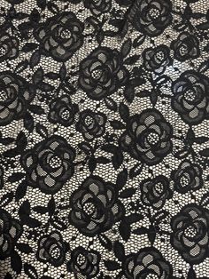 black and white lace with roses on it