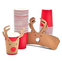 paper cups with reindeer faces are lined up