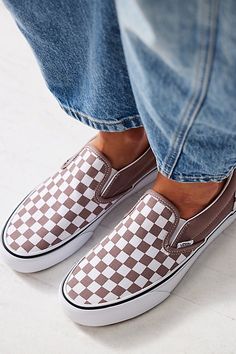 Classic slip-on Vans with a too cool checkered design. Featuring sturdy canvas upper and rubber sole for an ultra-comfortable wear. | Classic Checkered Slip-On by Vans at Free People in Brown, Size: US 7.5 M Checkered Vans Outfit, Slip On Outfit, Vans Checkered, Christmas Boots, Vans Outfit, Nashville Outfits, Checkered Design, Vans Style, Fall Winter Wardrobe