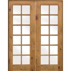 a double door with glass panels and wood frame