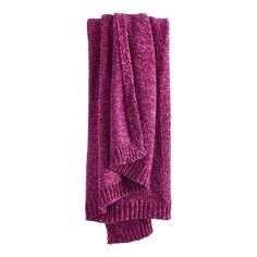 a purple towel folded up on top of each other