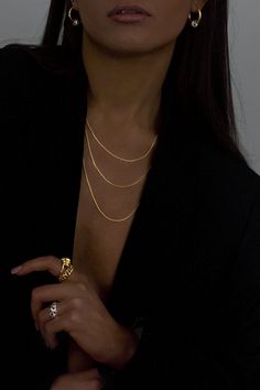 A sleek and versatile piece in the Hydez Essential Collection, the York 18K Gold vermeil snake chain necklace smooth and reflective design drapes on your neck like liquid gold. Slightly more slender than the Elliot necklace, York has the perfect balance of elegance and simplicity, to effortlessly transition from day to night. Material: 18K Gold VermeilWidth: 1 mmLength: Available in 16", 18" and 20" What is 18K Gold Vermeil?: 3 microns of 18K Gold over Sterling Silver. Vermeil is far more durabl Luxury Minimalist Jewelry For Fashion Statement, Minimalist Luxury Jewelry For Everyday, Luxury Jewelry With Elegant Design For Everyday, Luxury Delicate Jewelry For Layering, Luxury Elegant Jewelry 16 Inch Length, Luxury Timeless Everyday Jewelry, Luxury Classic Stackable Jewelry, Luxury Designer Elegant Jewelry, Luxury Elegant Designer Jewelry