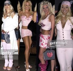 four women dressed in costumes posing for the camera