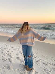 The Poppy Blush and Blue Striped Oversized Sweater is the coziest and cutest sweater for your day-to-day outfits! Blush and blue striped fabric shape this oversized sweater with a round neck, a tunic length, and bubble sleeves. Features ribbed accents at the hem. Style your favorite baggy jeans for a casual look. DETAILS & CARE 55% Cotton/30% Acrylic/15% Nylon Hand wash cold. Imported. Cute Sweater Oversized, Jeans Outfit Cute, Costal Grandaughter Aesthetic Outfits, Windy Beach Outfit, Cute Aesthetic Clothing, Cute Cold Beach Outfits, Outfit Inspo Sweater, Sweater Women, Cold Beach Outfit Winter