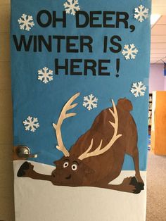 a bulletin board with an image of a reindeer and snowflakes on it that says, oh deer, winter is here