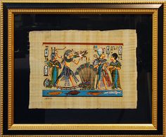 an ancient egyptian painting on display in a gold frame