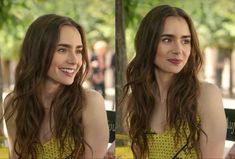 a woman with long brown hair wearing a yellow dress and smiling at the camera while sitting on a bench