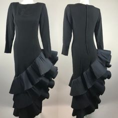 Victor Costa Black Long Sleeve | Party Dress | Gown | Art To Wear | Structured Dress | Fully Lined Asymmetrical | Ruffles | Pleats | Flamenco Style | Back Zip Closure Holiday | Formal | Black Tie | Wedding Vintage Women's Size 16 | 20.5 Pit To Pit | 16.5 Waist | 21 Hip 24.5 Sleeve Length | 57 Longest Length Asymmetrical Ruffled Formal Evening Dress, Asymmetrical Ruffled Evening Dress For Formal Occasions, Formal Black Evening Dress With Ruffles, Asymmetrical Fitted Evening Dress With Ruffles, Vintage Dresses With Ruffles For Gala, Black Long Sleeve Party Dress, Formal Black Tie Wedding, Victor Costa Dress, African Head Scarf