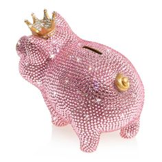 a pink pig with a gold crown on its head