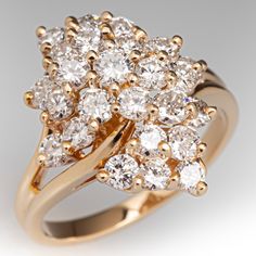 a diamond cluster ring on a white background