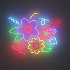 a neon sign that has flowers on it