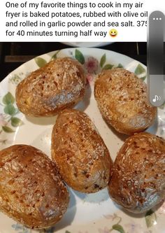 four baked goods sitting on a plate with the caption'one of my favorite things to cook in my air fryer is baked potatoes, rub