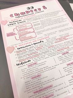 a pink and white menu with some writing on the inside of it's paper