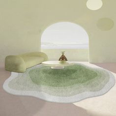 a living room with an oval shaped couch and round coffee table in the center, on top of a green area rug