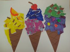 three ice cream cones with colorful paper on them