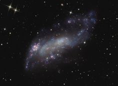 an image of a spiral galaxy in the sky