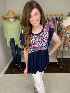 This new top is big on style and comfort! It's a flattering peplum-style fit and the ribbed fabric has lots of stretch. We can't think of a cuter top for the office this summer! This pairs perfectly with your fave white denim and the colors will work into fall. If you're looking for a top that will give you lots of wear, look no further! Top measures 27" in length. Bust measures 21" from underarm seam to seam. Measurements taken on a small. Fabric has stretch. This has an easy fit throughout. Yo Trendy Peplum Tops For Summer, Cotton Peplum Top For Brunch, Casual Cotton Peplum Top, Casual Peplum Top For Summer, Casual Cotton Peplum Top For Brunch, Spring Peplum Top For Brunch, Casual Cotton Peplum Top For Spring, Casual Short Sleeve Peplum Top For Brunch, Cotton Peplum Top For Day Out