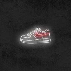 a neon light up shoe on a black background with the word nike written below it