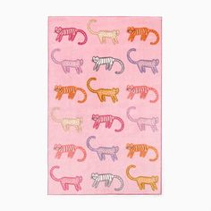 a pink towel with different colored cats on it