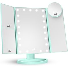 a mirror with lights on top of it in front of a white wall mounted mirror