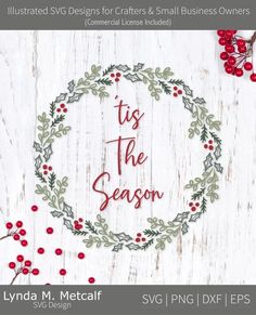 christmas wreath with the words tis the season in red and green on white painted wood