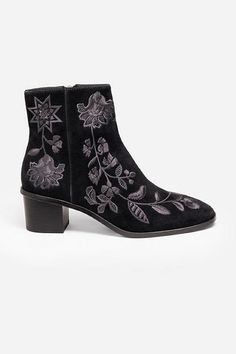 Crafted from 100% luxurious suede, the Chiara Embroidered Suede Booties are the perfect statement piece for the cooler season. Featuring intricate floral embroidered detailing on a rich black suede backdrop, these booties are finished with a rounded toe and classic block heel. Pair with a silk blouse and cropped denim to highlight these unique boots. Johnny Was Women's Chiara Embroidered Suede Bootie in Black, Size 8, Silk/Denim/Suede, Floral Unique Boots, Boho Chic Outfits, Pretty Shoes, Cropped Denim, Johnny Was, Suede Booties, Boot Shoes Women, Cute Fashion, Silk Blouse