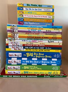 a stack of children's books sitting on top of each other