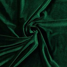 Stretch velvet fabric is a 4-way stretch fabric with a smooth back and textured polyester velvet front. This fabric is extremely soft with a beautiful sheen. This is a medium weight fabric of 253 gsm (approx.) with a90% polyester 10% spandex content and 58/60" width. The polyester content makes it ideal for washing. This fabric is great for apparel, costumes, dance wear, decorations and more. The velvethas a soft texture, drapes very well with hemmed edges. Its wide width also makes it an ideal Green Velvet Fabric, Ballet Boys, Velvet Fabrics, Dark Green Aesthetic, Slytherin Aesthetic, Soft Furnishings Cushions, Fusion Mineral Paint, Mirrored Furniture, Stretch Velvet