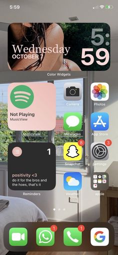 an iphone screen showing the home screen with icons and numbers on it, as well as other app icons