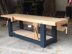 a workbench with tools on it in a garage