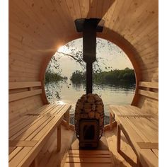 the inside of a wooden boat with benches