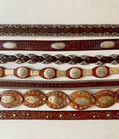 Vintage Concho Belt Brighton Double S Morocco Brown Leather silver mesh studs SCROLL DOWN 4 Info  ....CHOOSE ONE (of 5)   1) Brighton buckle stay Brown, scrolled slides, 37x 1 1/4", 5 holes30.5-34.5, size M, $68 2) Roundtree York Silver Buckle stays tip, Brown Leather, Silver stamped oval concho, 38x 1 1/4", 5 holes: 31,5-35.5", size 32, $88 3) Silver buckle stay, Brown braided Leather, silver floral slides, 40x 1 1/4", 32,5-36.6", size M, $78  4)SOLDSOLD Double S, shaped Brown, Silver floral ro Double S, Concho Belt, Western Leather, Vintage Belts, Brown Silver, Suspender Belt, Leather Silver, Braided Leather, Silver Studs