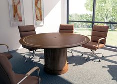 a conference table with chairs around it in front of a large window overlooking the park