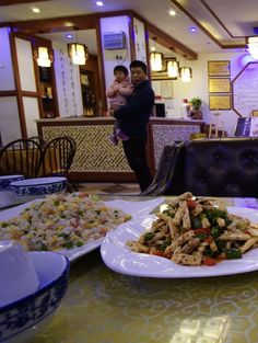 plates of food on a table in a restaurant