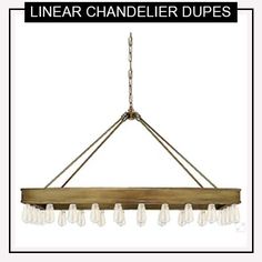 a wooden chandelier hanging from a ceiling